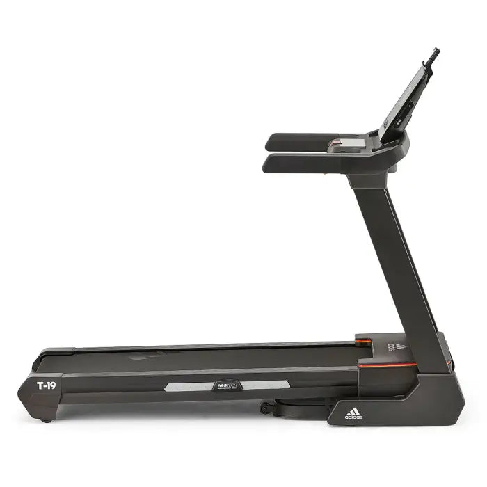 Black treadmill with a white background