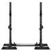 Black squat rack on a white background