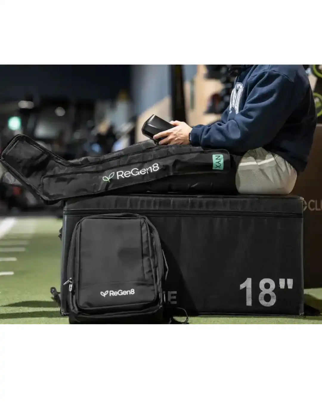 Black portable recovery system with a carrying bag.