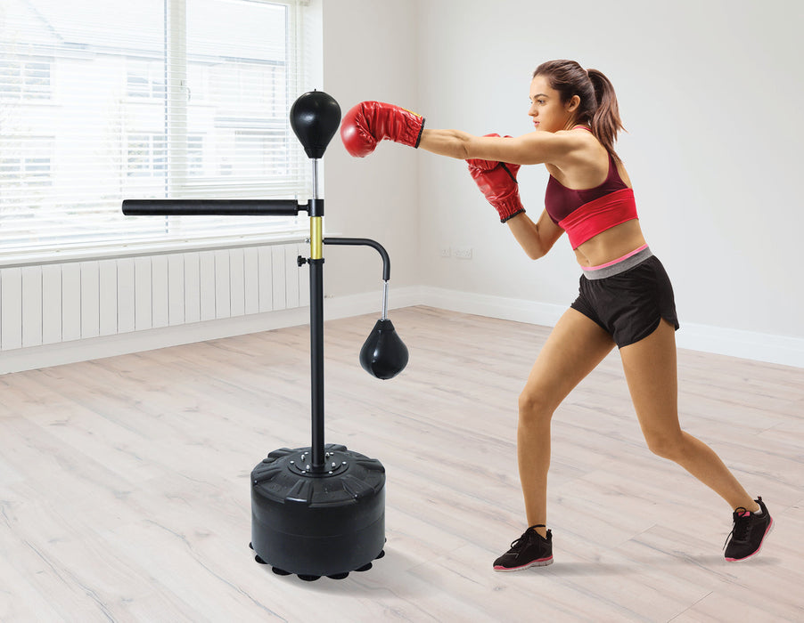 Fit Beautiful Woman Boxer Hitting A Huge Punching Bag Exercise Class In A  Gym Boxer Woman Making Direct Hit Dynamic Movement Healthy Sports Lifestyle  Fitness Workout Concept With Copy Space Stock Photo -